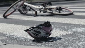 Broken Childs Helmet and Bike